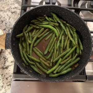 Ready to serve Skillet Green Bean in skillet. Cooked in butter, garlic, and low-sodium soy sauce.